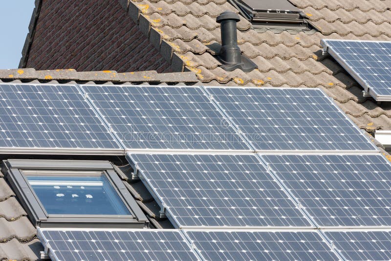 Home with roof and solar panels