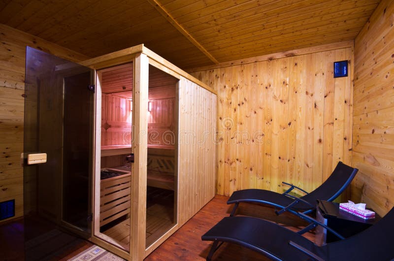 Sauna Interior Cabin Detail With Open Door And Lit Lighting