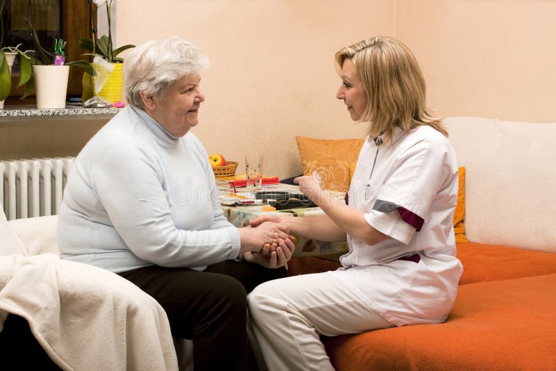 Home visit nurse with senior