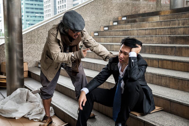 Homeless man cheer up depress businessman stock photos Homeless man cheer up depress businessman stock photos