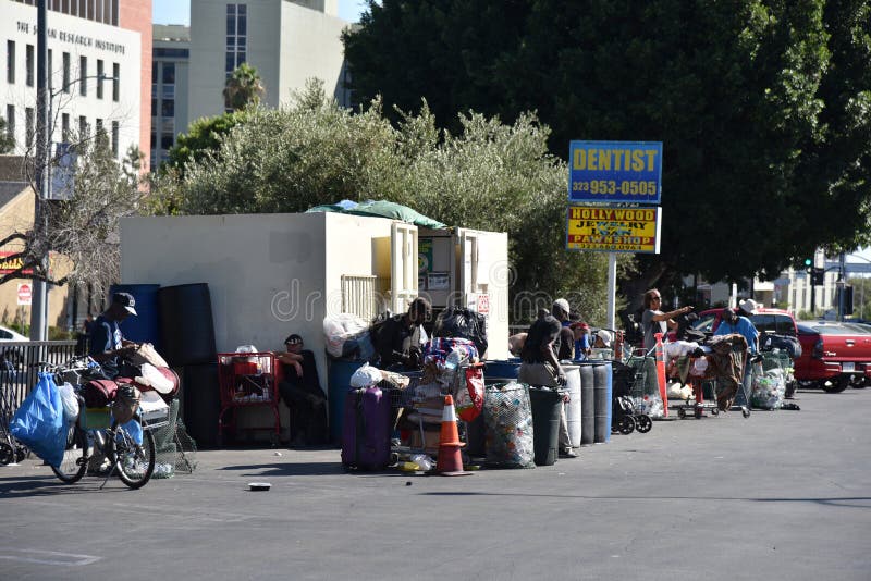 Homeless People Gather at a Recycling Center royalty free stock photos Homeless People Gather at a Recycling Center royalty free stock photos