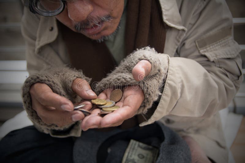Homeless senior adult man sitting and begging in overpass royalty free stock photo Homeless senior adult man sitting and begging in overpass royalty free stock photo
