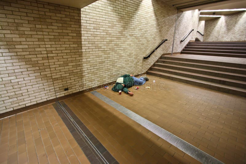 Homeless sleeping on the ground royalty free stock photography Homeless sleeping on the ground royalty free stock photography