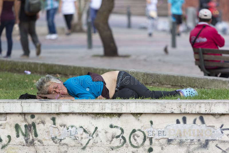 Image result for homeless woman sleeping on sidewalk