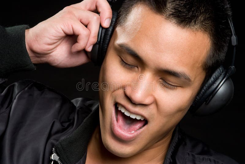 Homem Asiático da Música imagem de stock royalty free