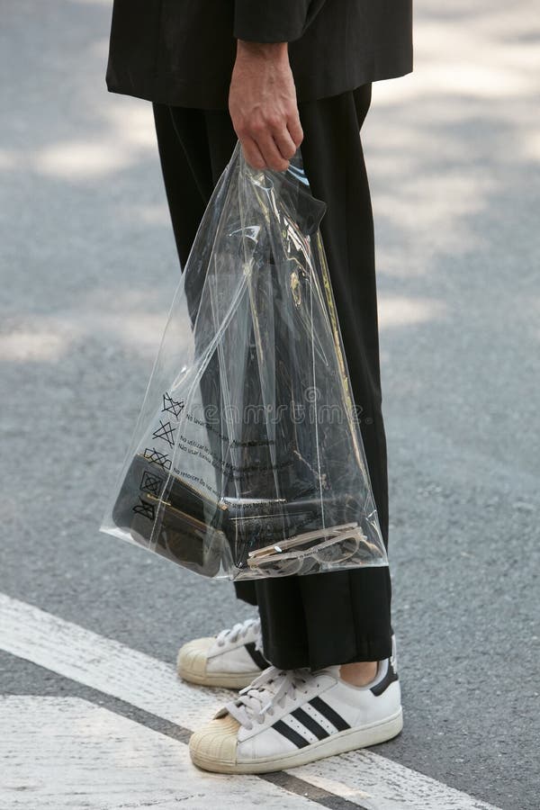 Calça transparente best sale plastico