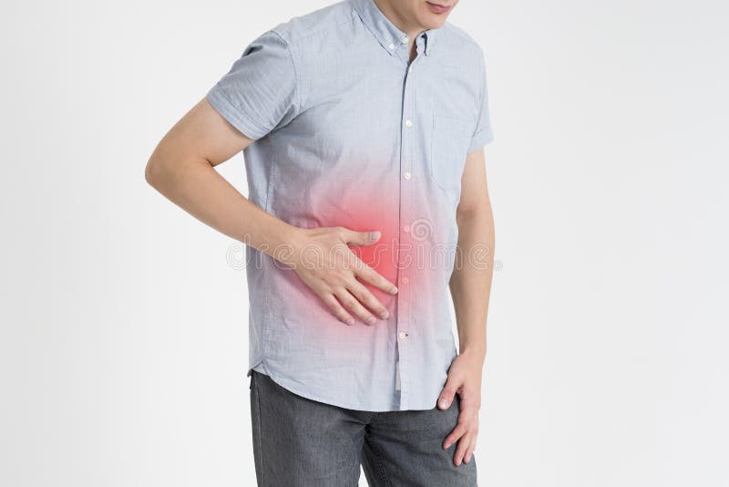 Man with abdominal pain, stomach ache on gray background, with red dot. Man with abdominal pain, stomach ache on gray background, with red dot