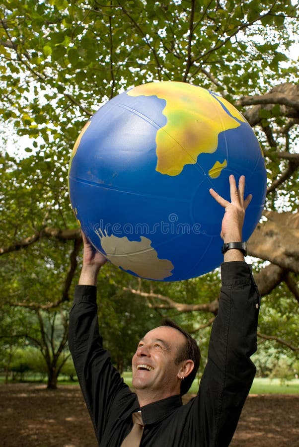 Homem com globo foto de stock royalty free Homem com globo foto de stock royalty free