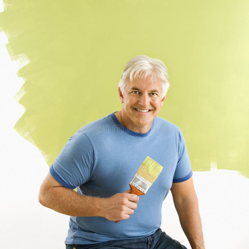 Homem com pincel. imagem de stock Homem com pincel. imagem de stock