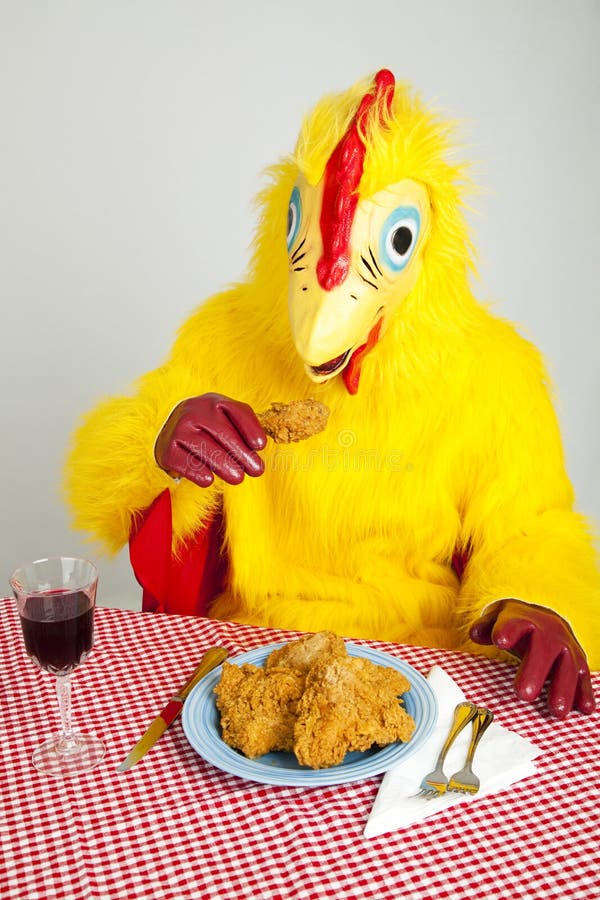 Chicken man sitting down to a fried chicken dinner. Disgusting!. Chicken man sitting down to a fried chicken dinner. Disgusting!