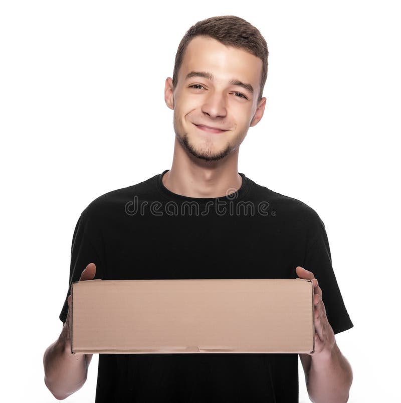 Homem de entrega novo de sorriso imagens de stock royalty free Homem de entrega novo de sorriso imagens de stock royalty free