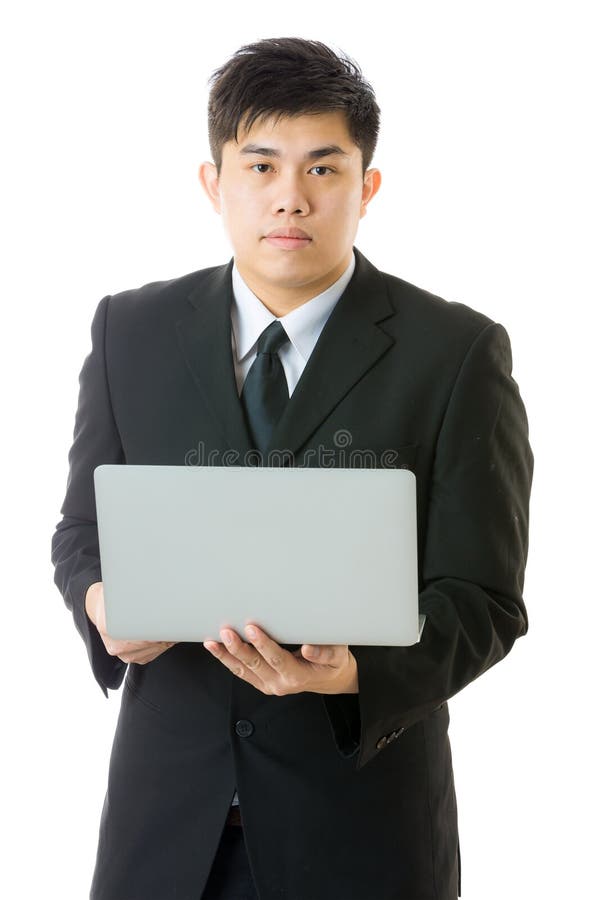 Homem de negócios asiático que usa o portátil fotografia de stock royalty free Homem de negócios asiático que usa o portátil fotografia de stock royalty free