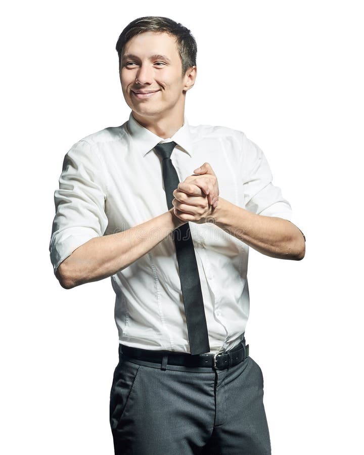 Homem de negócios bem sucedido que gesticula o sinal do sucesso fotografia de stock Homem de negócios bem sucedido que gesticula o sinal do sucesso fotografia de stock