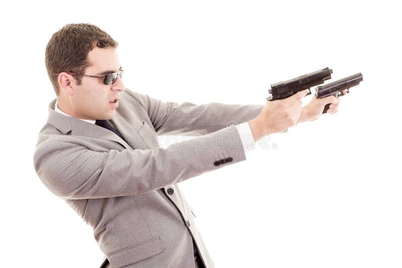 Homem de negócios com a arma isolada no branco imagem de stock royalty free Homem de negócios com a arma isolada no branco imagem de stock royalty free
