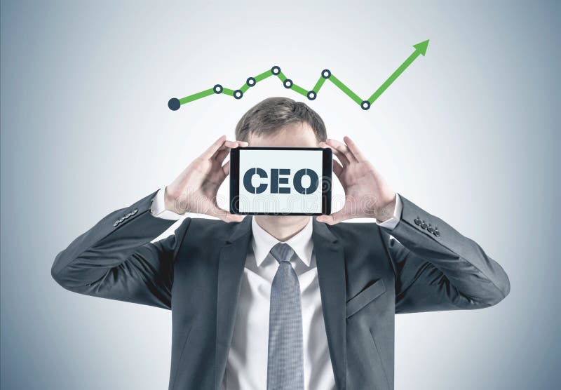 Homem de negócios com a tabuleta de gráfico do CEO fotos de stock royalty free Homem de negócios com a tabuleta de gráfico do CEO fotos de stock royalty free