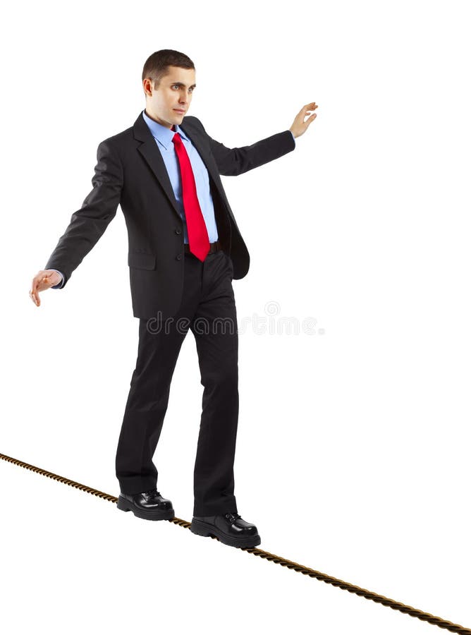 Homem de negócios de equilíbrio fotografia de stock royalty free Homem de negócios de equilíbrio fotografia de stock royalty free