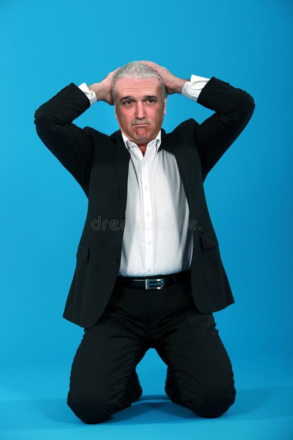 Homem de negócios desesperado fotografia de stock Homem de negócios desesperado fotografia de stock