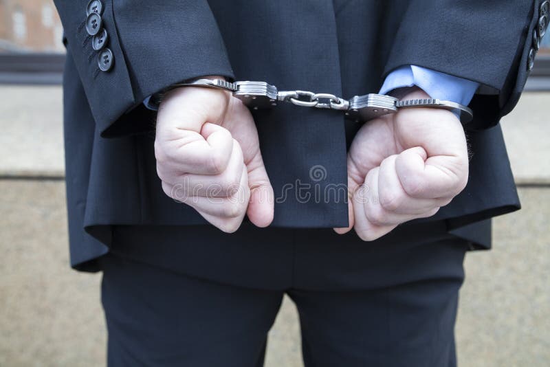 Homem de negócios nas algemas imagem de stock Homem de negócios nas algemas imagem de stock