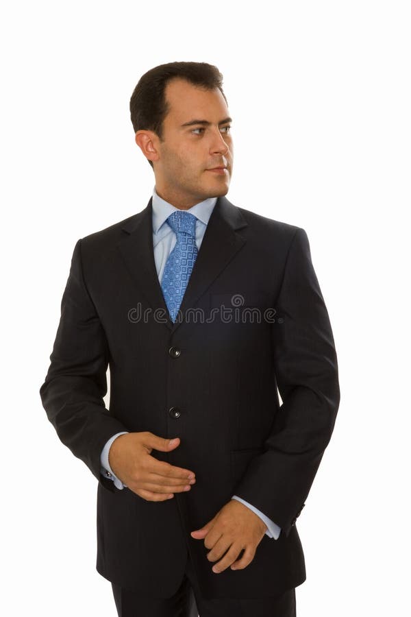 Homem de negócios novo Self-assured que olha à esquerda imagens de stock royalty free Homem de negócios novo Self-assured que olha à esquerda imagens de stock royalty free