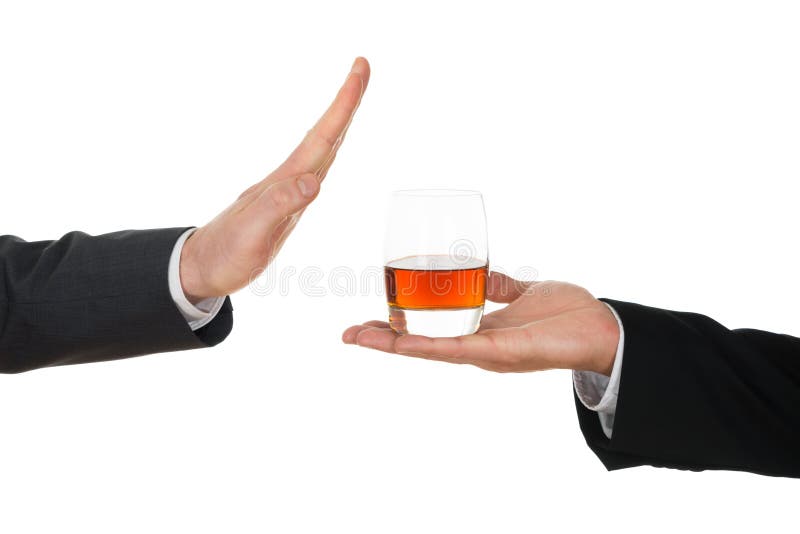 Homem de negócios que evita o álcool foto de stock royalty free Homem de negócios que evita o álcool foto de stock royalty free