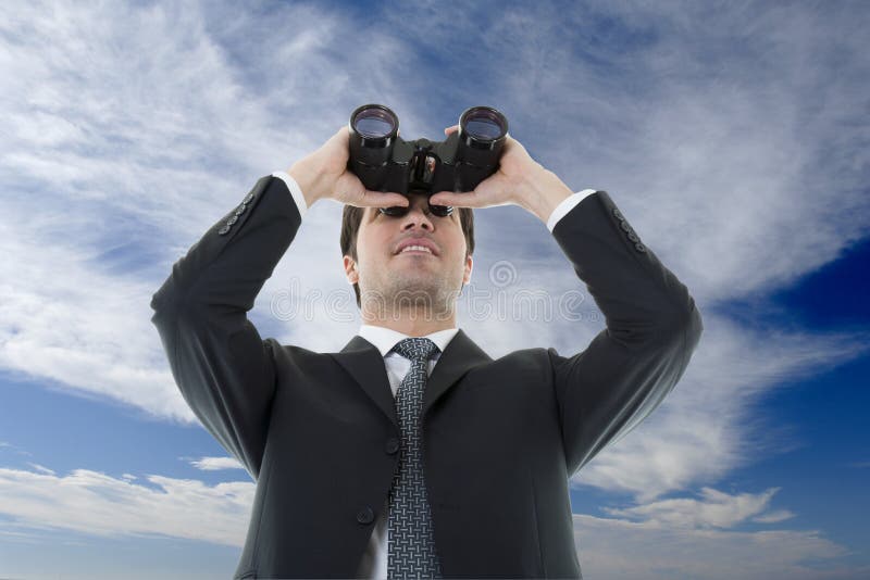 Empresário a observar com binóculos foto de stock royalty free