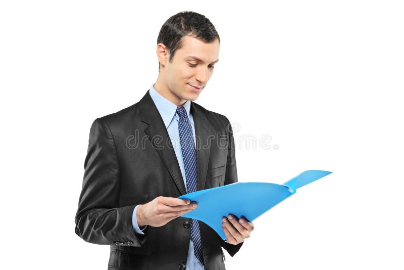 Homem de negócios Reading um original fotos de stock Homem de negócios Reading um original fotos de stock