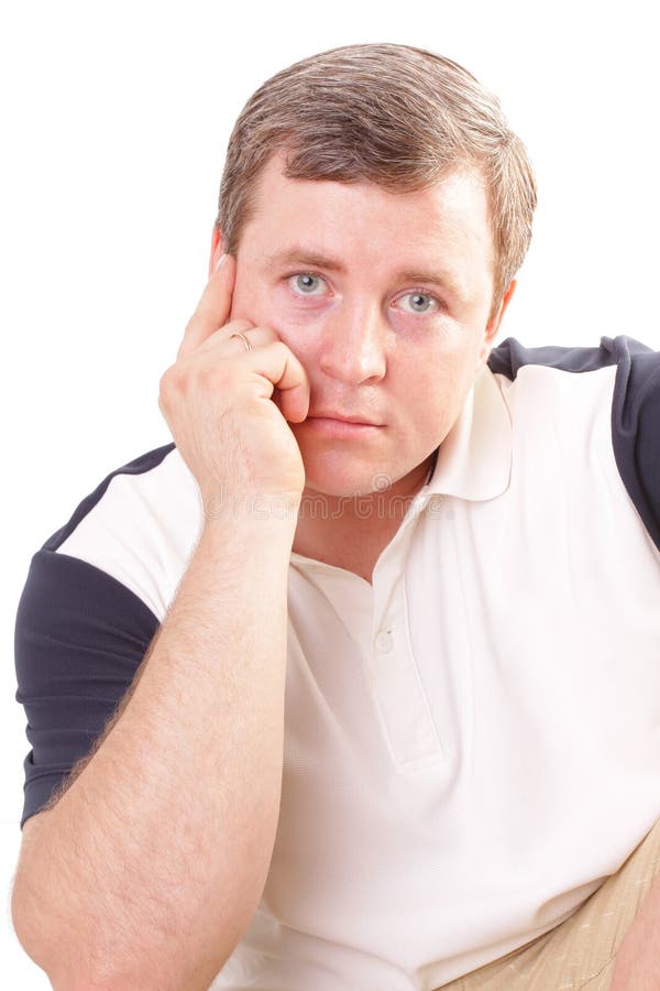 Homem taciturno isolado sobre fundo branco fotografia de stock royalty free