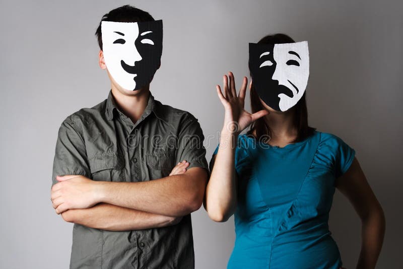 Man and woman in theatre black and white emotions masks, half body. Man and woman in theatre black and white emotions masks, half body