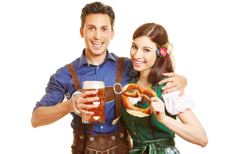 Homem e mulher em Oktoberfest imagens de stock royalty free Homem e mulher em Oktoberfest imagens de stock royalty free