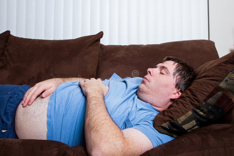 Homem gordo que estabelece imagem de stock royalty free Homem gordo que estabelece imagem de stock royalty free