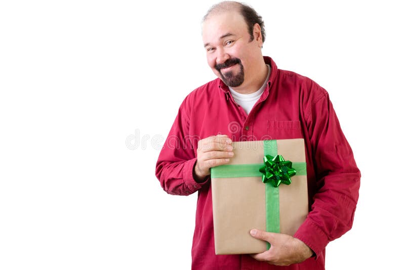 Homem grato que guarda um presente com um sorriso feliz fotos de stock Homem grato que guarda um presente com um sorriso feliz fotos de stock