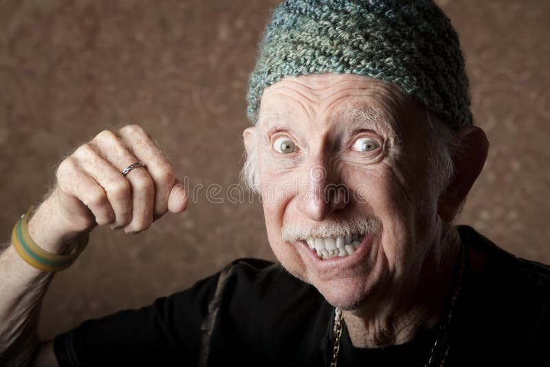 Homem idoso irritado imagem de stock Homem idoso irritado imagem de stock