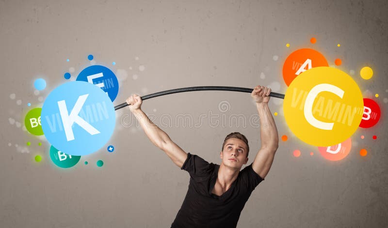 Homem muscular que levanta pesos coloridos da vitamina fotografia de stock Homem muscular que levanta pesos coloridos da vitamina fotografia de stock