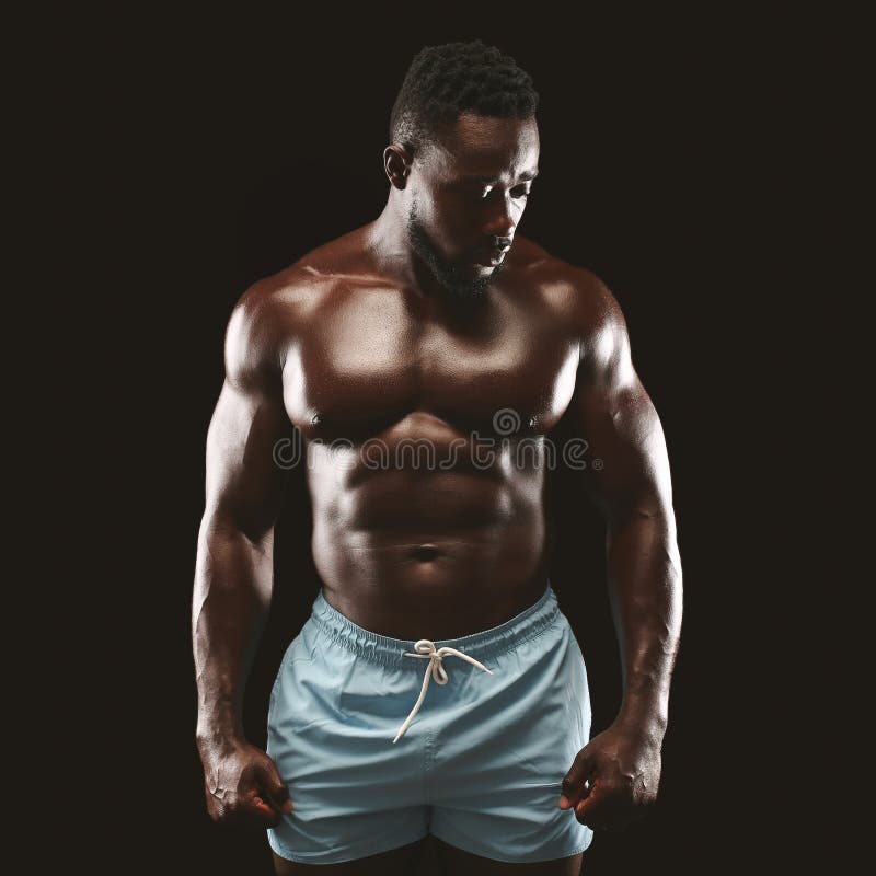 Homem Negro Atlético Forte, Posando No Estúdio, Demonstrando Corpo Muscular  Foto de Stock - Imagem de modelo, esporte: 157938374