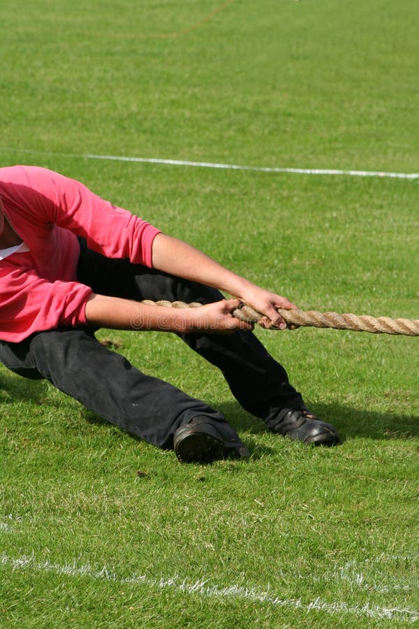 Man in tug of war competition at highland games. Man in tug of war competition at highland games