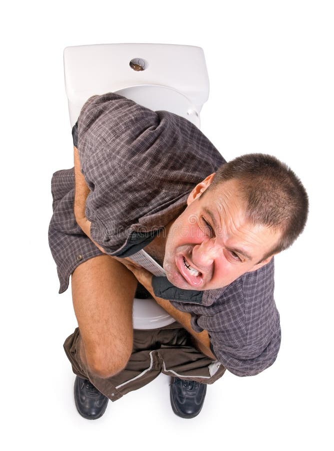 Homem no toalete foto de stock Homem no toalete foto de stock