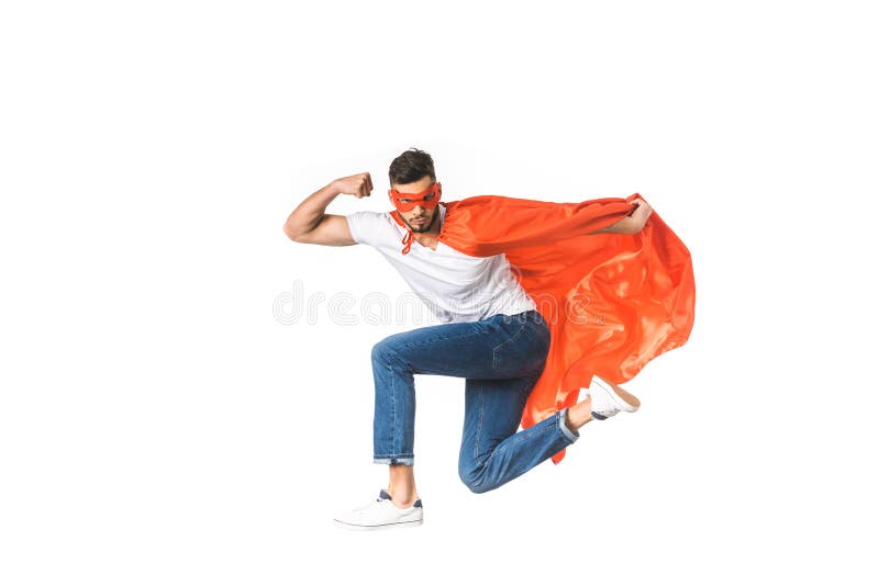 homem novo no casaco vermelho e máscara que olha a câmera e que mostra o bíceps fotos de stock royalty free homem novo no casaco vermelho e máscara que olha a câmera e que mostra o bíceps fotos de stock royalty free