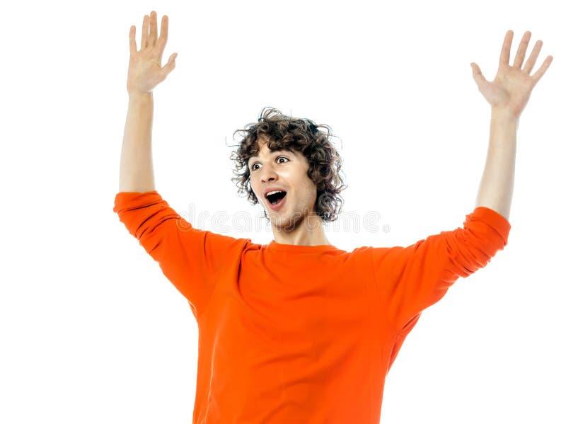 Homem novo que gesticula o retrato feliz surpreendido da alegria imagem de stock royalty free Homem novo que gesticula o retrato feliz surpreendido da alegria imagem de stock royalty free