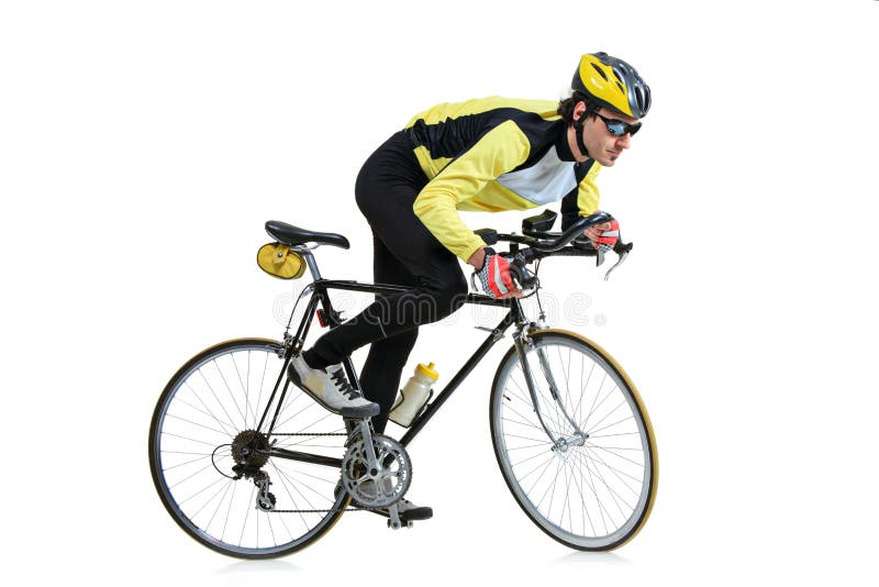 Homem novo que monta uma bicicleta fotografia de stock royalty free Homem novo que monta uma bicicleta fotografia de stock royalty free