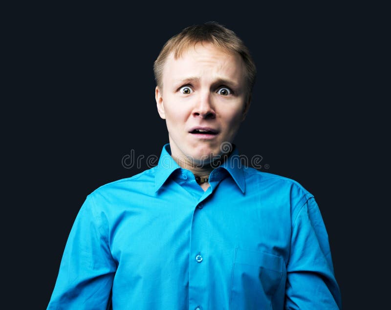 Homem novo Scared foto de stock Homem novo Scared foto de stock