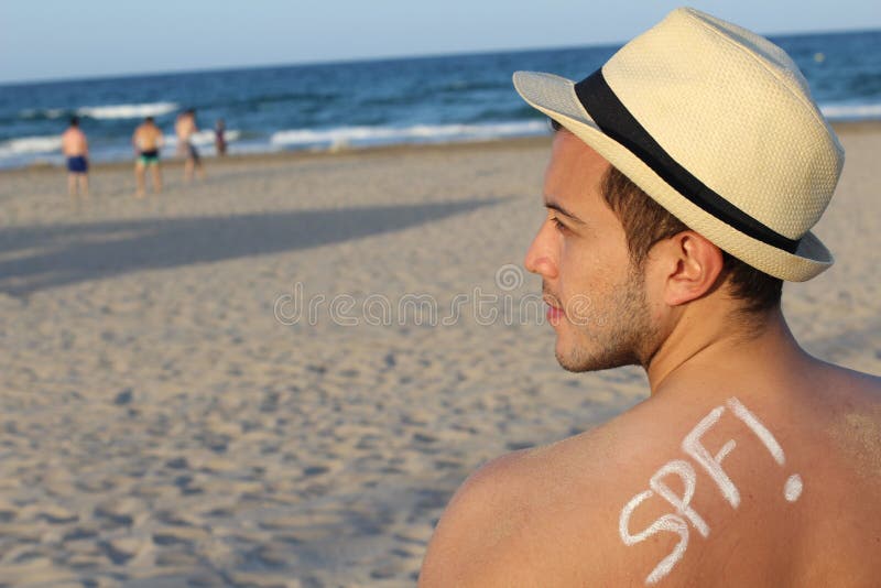 Man protecting his skin agains the sun. Man protecting his skin agains the sun.