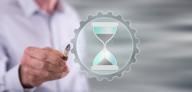 Homem que toca em um conceito da gestão de tempo imagens de stock Homem que toca em um conceito da gestão de tempo imagens de stock