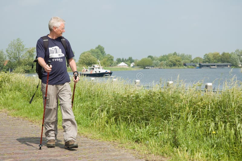 Active senior man is going for a Nordic Walk. Active senior man is going for a Nordic Walk.