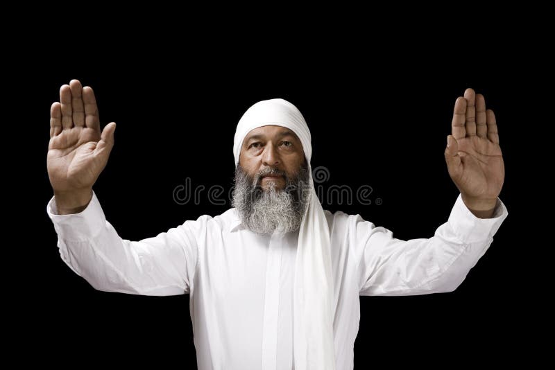 Homem árabe que Praying imagem de stock royalty free Homem árabe que Praying imagem de stock royalty free