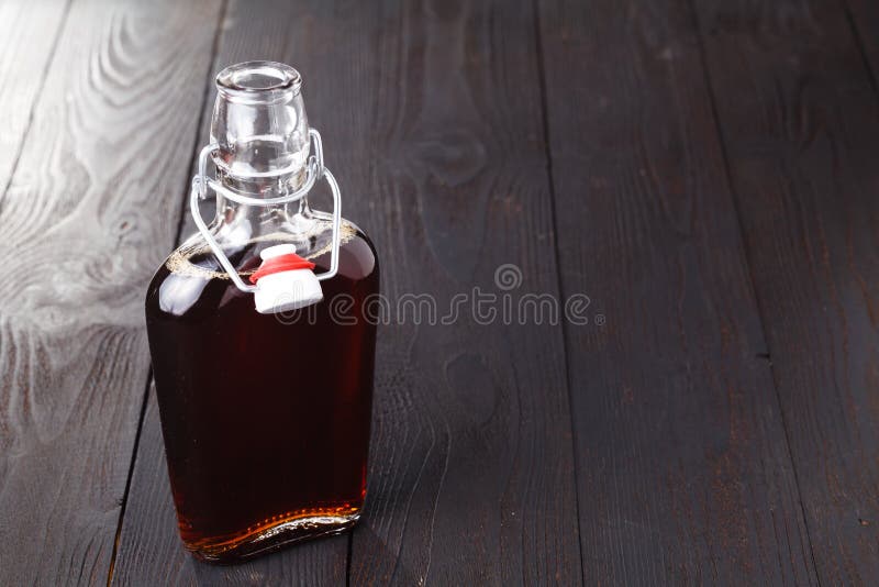 Homemade Alcohol Cordial Drink in Bottle on Table Stock Photo Image