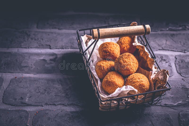 Homemade Arancini - Deep Fried Rice Balls Stuffed with Mozzarella