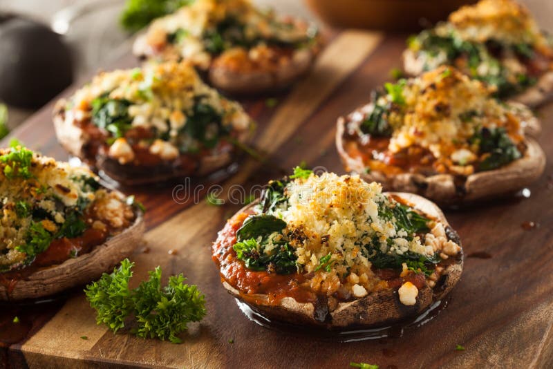 Homemade Baked Stuffed Portabello Mushrooms. With Spinach and Cheese royalty free stock images