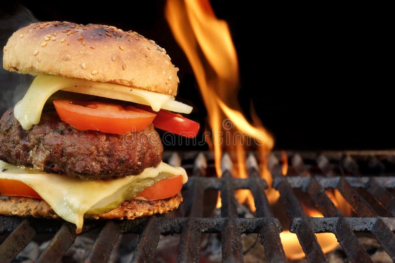 Homemade BBQ Beef Burger On The Hot Flaming Grill