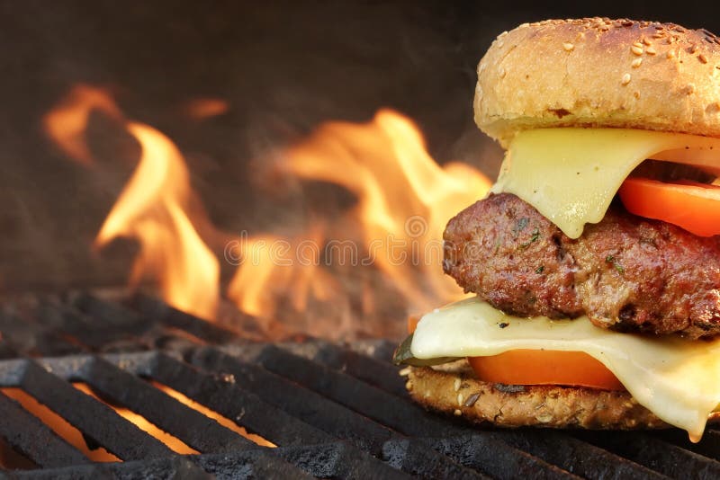 Homemade BBQ Beef Burger On The Hot Flaming Grill