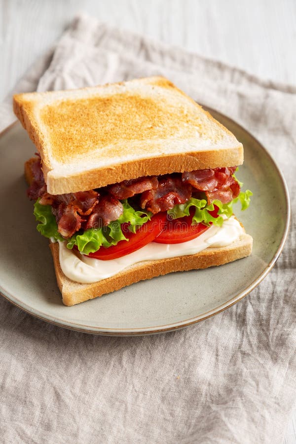 Homemade BLT Sandwich (Bacon, Lettuce and Tomato) on a Plate, Side View